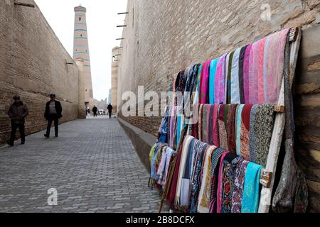 Colorful scarves on stall on sale on the street in Khiva, Uzbekistan Stock Photo