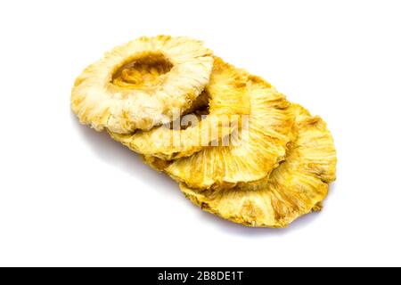 dried pineapple rings on white background Stock Photo