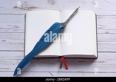 open notebook and fountain pen on table  Stock Photo