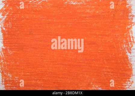 orange vax color  crayon on white paper background texture Stock Photo