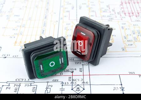 Electrical switches lie on the electronic circuit. Stock Photo