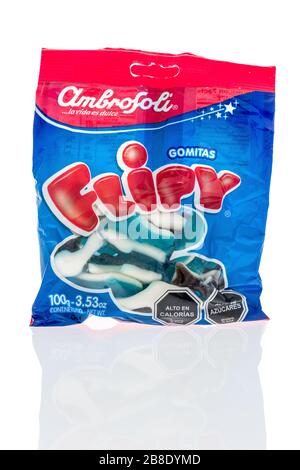 Winneconne,  WI - 17 March 2020:  A package of Ambrosoli flipy gummy sharks on an isolated background. Stock Photo