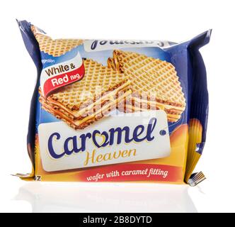 Winneconne,  WI - 17 March 2020:  A package of White and red flag caramel heaven wafers on an isolated background. Stock Photo