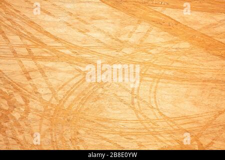 Car traces on construction ground side over dust clay and sand view from above Stock Photo