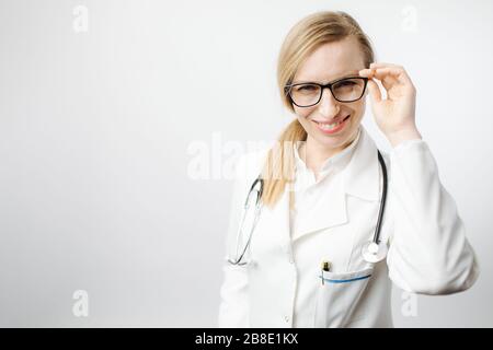 Portrait of medical worker in lab coat and eyeglasses Stock Photo