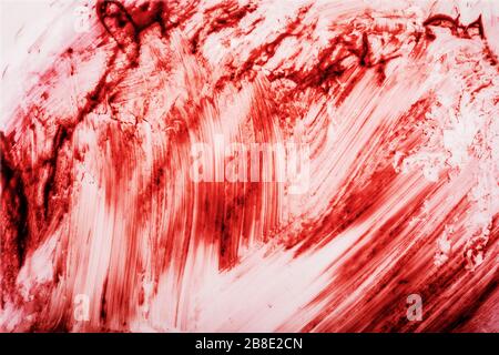 Red bloody marks on white background Stock Photo