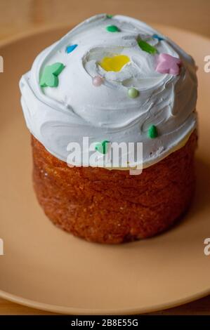 Easter cupcake on a plate. Easter, cupcake, holiday. Plate with easter cupcake. Easter is coming Stock Photo