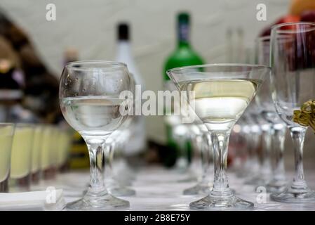 Different fresh alcoholic cocktail in glass on bar table, many colorful drinks. Party and holiday celebration concept Stock Photo
