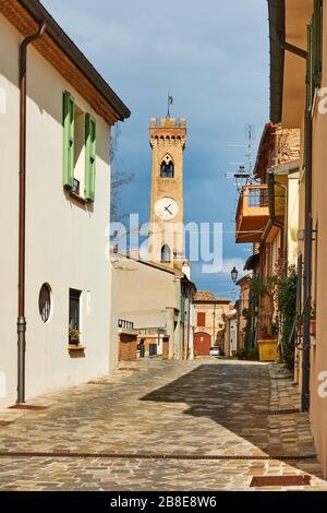 Old street with bell tower in Santarcangelo di Romagna town, Emilia-Romagna, Italy Stock Photo