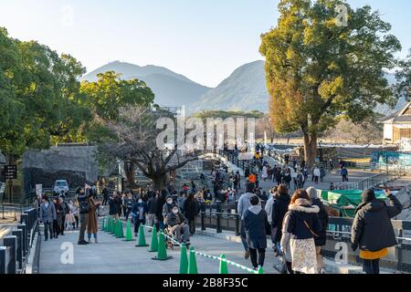 Tourists visiting Kumamoto Castle in New Year holiday. The castle sustained damage in earthquake on 2016. Stock Photo