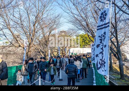 Tourists visiting Kumamoto Castle in New Year holiday. The castle sustained damage in earthquake on 2016. Stock Photo