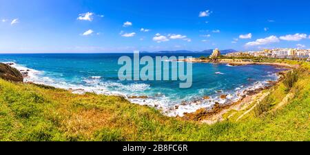 Scenic panoramic view of Mediterranean seacoast in Alghero city, Sardinia island, Italy Stock Photo