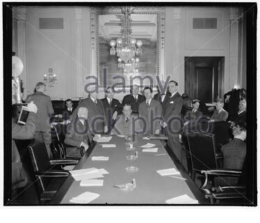 seated: Elmer Thomas, Ellison Smith (Chairman). Standing ...