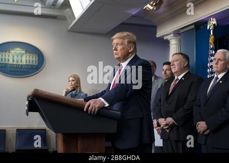 Washington, United States Of America. 20th Mar, 2020. President Donald J. Trump, joined by Vice President Mike Pence and members of the White House Coronavirus Task Force, delivers remarks during a coronavirus update briefing Friday, March 20, 2020, in the James S. Brady Press Briefing Room of the White House. People: President Donald Trump Credit: Storms Media Group/Alamy Live News Stock Photo