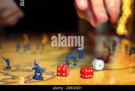 Kaufbeuren, Germany. 21st Mar, 2020. A family plays the board game 'Risk' in their house. (to dpa-KORR: 'Lagerkoller or a chance? How to (survive) in isolation' from 22.03.2020). Credit: Karl-Josef Hildenbrand/dpa/Alamy Live News Stock Photo