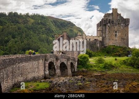 Stone bridge leading to Eilean Donan Castle, Isle of Skye, Scotland, UK Stock Photo