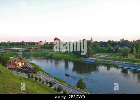 View of the Neman river and the city during sunset on a summer day Stock Photo
