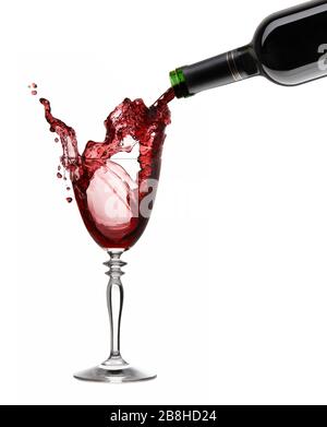 Pouring a glass of red wine with clipping path at white nackground. High Quality XXL! Stock Photo
