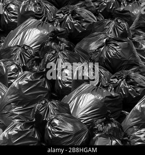 Background garbage bag black bin, Garbage dump, Bin,Trash, Garbage, Rubbish,  Plastic Bags pile junk garbage Trash texture Stock Photo - Alamy