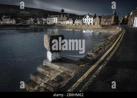 View of the quiet harbour at Stonehaven, Aberdeenshire on a sunny December winter morning. Stock Photo