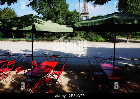 Tables and chairs at a green outdoor cafe. Nusa Dua, Bali, Indonesia ...