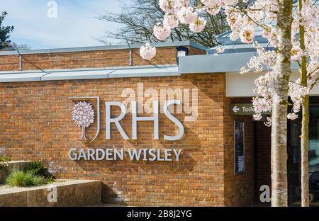 RHS Garden, Wisley, Surrey.  Name and logo on the wall of the new entrance building, in spring on a sunny day Stock Photo