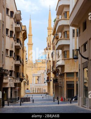 Perspective of newly rebuilt Nejmeh square area in Beirut Downtown city centre and Al Amine blue mosque, Lebanon Stock Photo