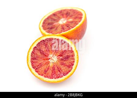 Close-up blood red oranges, citrus fruits isolated on white background Stock Photo
