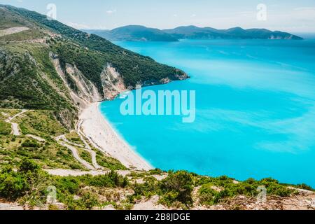 Famous Myrtos Beach. Must see visiting tourism location on Kefalonia island in summer. Greece Stock Photo