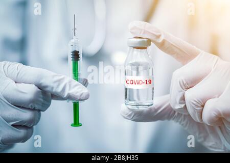 Vaccine and syringe injection for prevention and treatment from corona virus infection (novel coronavirus, COVID-19, nCoV 2019). Stock Photo