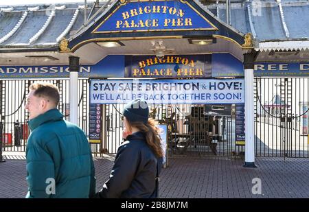 Brighton UK 22nd March 2020 - Brighton Palace Pier is closed to the public during the Coronavirus COVID-19 pandemic crisis  . Credit: Simon Dack / Alamy Live News Stock Photo