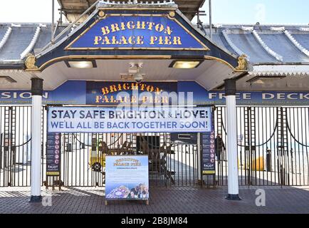 Brighton UK 22nd March 2020 - Brighton Palace Pier is closed to the public during the Coronavirus COVID-19 pandemic crisis  . Credit: Simon Dack / Alamy Live News Stock Photo