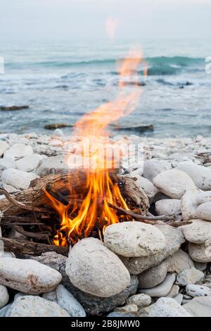 Fire on the beach - selective focus, copy space Stock Photo
