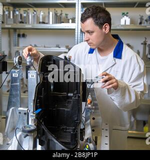 instrument for precise 3D measurement of plastic moldings for the automotive industry Stock Photo