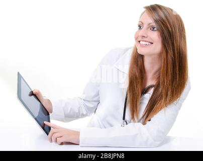 Pretty female student doctor working with an digital tablet Stock Photo