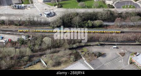 a merseyrail train pulling in to Port Sunlight railway sation, Wirral Stock Photo