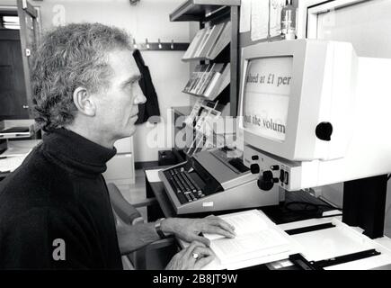Visually impaired man using large print screen at RNIB Loughborough, UK 1990 Stock Photo