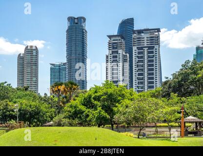 Office and residential high rise towers view from Lake KLCC Park Kuala Lumpur Malaysia. Stock Photo