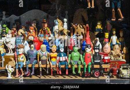 Brighton UK 22nd March 2020 - Wooden toys in a shop window enjoy some Spring sunshine today in Brighton during the Coronavirus COVID-19 pandemic crisis . Credit: Simon Dack / Alamy Live News Stock Photo