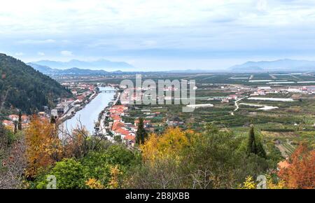 A view of the irrigated agricultural orchards and fields in the delta of the river Neretva in Opuzen, Croatia Stock Photo