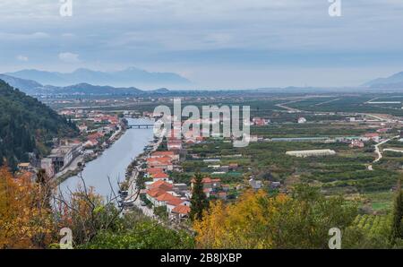 A view of the irrigated agricultural orchards and fields in the delta of the river Neretva in Opuzen, Croatia Stock Photo