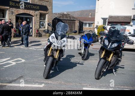 Hawes, North Yorkshire, UK. 22nd Mar 2020. Hawes in Wensleydale, North Yorkshire was overflowing with visitors, many of them motorcyclists from all over the north of England, ignoring Government advice to stay at home during the Covid-19 outbreak, and raising tensions with the local isolated rural community . Credit: Wayne HUTCHINSON/Alamy Live News Stock Photo