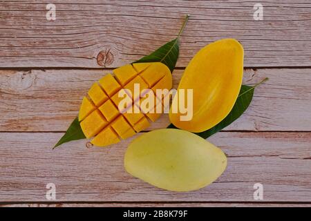 close up of mango fruits on the wooden background Stock Photo
