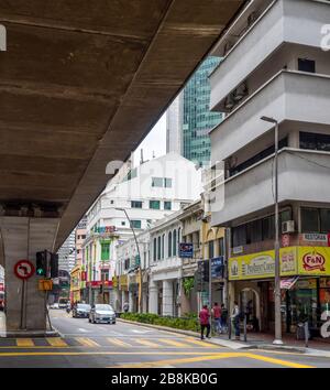 Elevated light rail system Rapid KL running along Jalan Tun Perak Chinatown Kuala Lumpur. Stock Photo