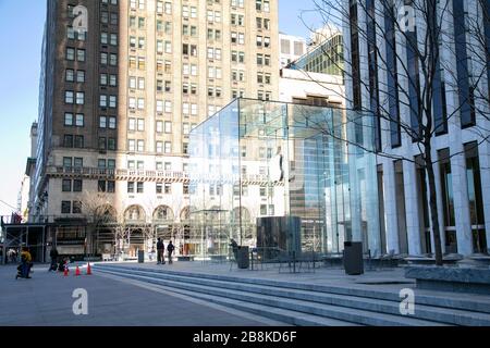 The glass cube entrance at Apple's iconic flagship store on 5th Avenue in New York City. Stock Photo