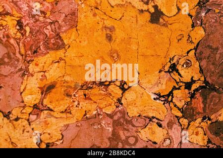 Red, orange and yellow marble texture. Stone background seamless pattern Stock Photo