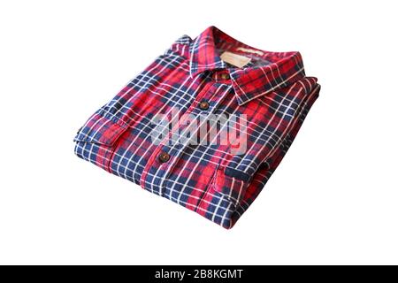 red checkered flannel shirt folded on a white isolated background Stock Photo
