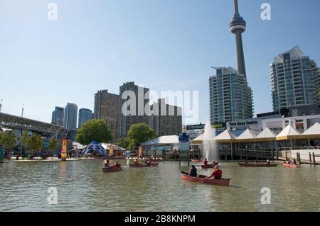 healthy lifestyle - paddling canoe in waterfront park (Toronto) Stock Photo