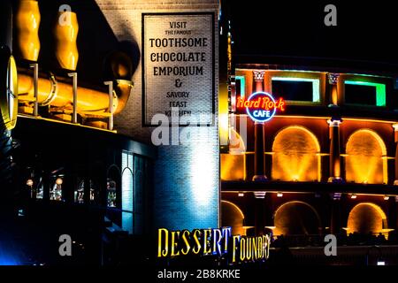 Orlando, Florida. February 12, 2020. Partial view of Hard Rock Cafe and Chocolate Emporium at Universals Citywalk Stock Photo