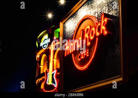 Orlando, Florida. February 12, 2020. Partial view of illuminated and colorful Hard Rock Cafe  at Universals Citywalk Stock Photo
